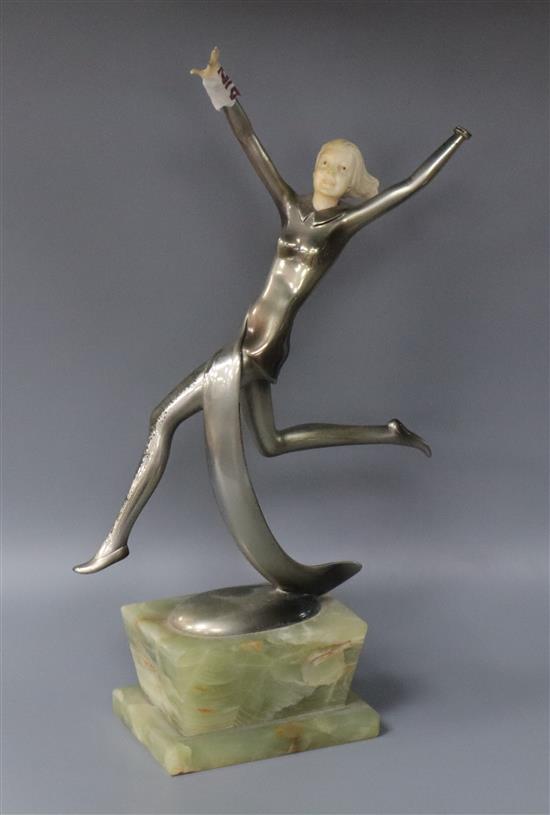 An Art Deco patinated bronze and ivory figure of a dancer by Dakon
